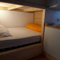 la chambre avecle lit de 140 dans l'appartement à port engaly 2